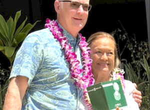 Kitty Simonds accepts the Outstanding Contribution to Pacific Coast Fisheries Award from PSMEC Executive Director Barry Thom Sept. 28, 2026. Photo: Eric Kingma. Kitty Simonds and Barry Thom
