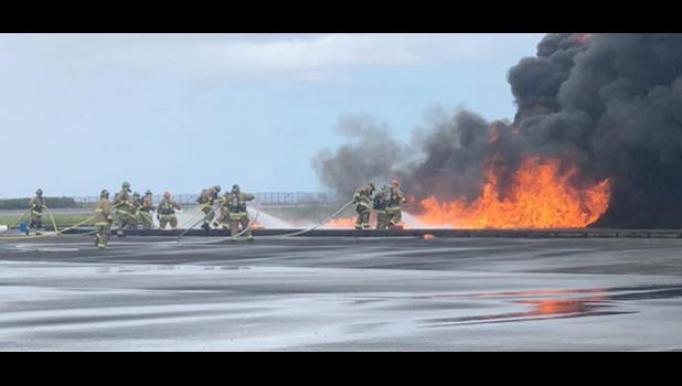  Airport firefighters fighting fire