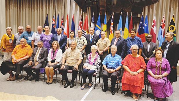 Uifa’atali Amata posing for a group portrait with Pacific leaders at the PICL
