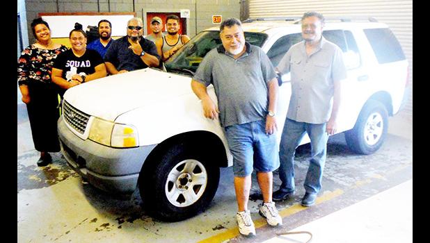ASCC Trades & Technical Department (TTD) program director Fred Suisala with others and the vehicle 