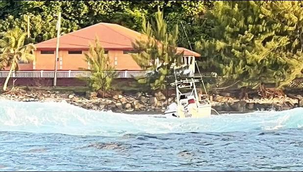 Fishing boat aground in Pago harbor