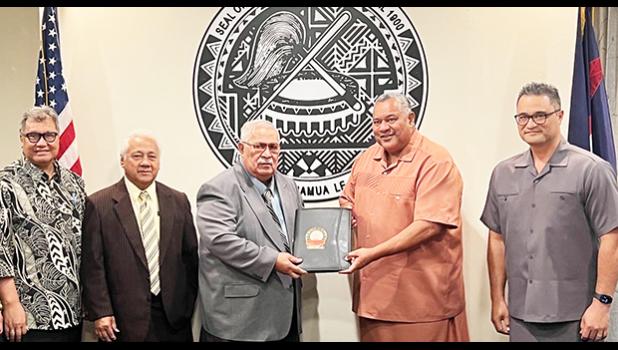 [l-r] Sixth Constitutional Convention secretary, Ti’alemasunu Dr. Mikaele Etuale; Vice Chairman Faiivae Iuli A. Godinet, Chairman Tuaolo Manaia Fruean, Gov. Lemanu Peleti Mauga, and Lt. Gov. Talauega Eleasalo Va’alele Ale