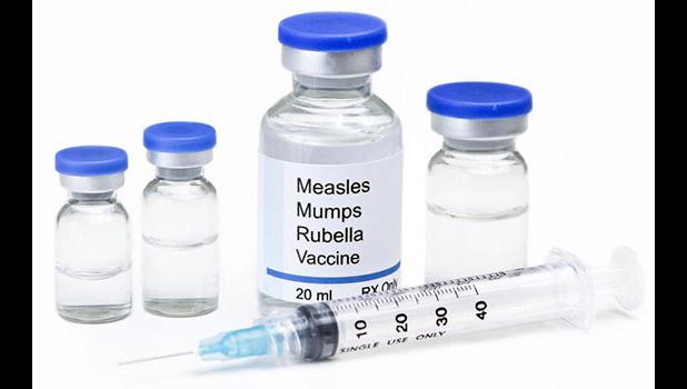MMR vaccine bottles and needle