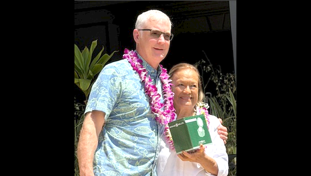 Kitty Simonds accepts the Outstanding Contribution to Pacific Coast Fisheries Award from PSMEC Executive Director Barry Thom Sept. 28, 2026. Photo: Eric Kingma. Kitty Simonds and Barry Thom