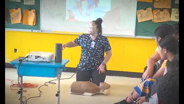 8th grade students of Tafuna Elementary School had the opportunity to learn valuable life-saving skills. [screen shot from video Tafuna student