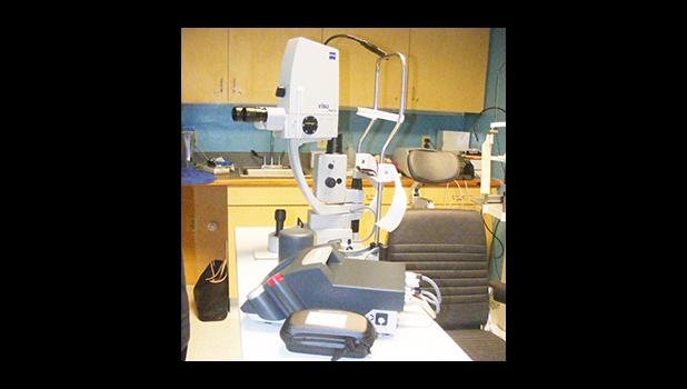 The new YAG laser (left on the table) as well as the eye examination/procedure chair seen last Thursday afternoon the LBJ Medical Center’s Eye Clinic.  [photo: FS]