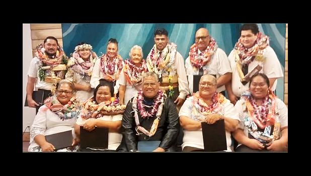 Pastor John Alailima (seated middle) and the 11 graduates 