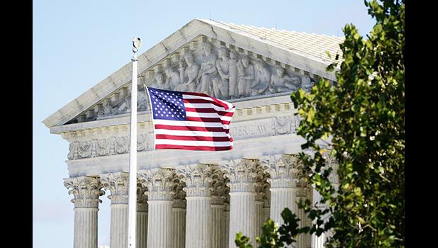 “The decision on Roe turns the clock back 50 years in the United States of America making her an outlier to join the likes of Iran, North Korea, and Russia,” the board wrote. U.S. Supreme Court building