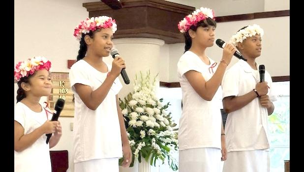 White Sunday children performing