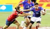 Samoa’s Elisapeta Alofipo makes a break against Spain