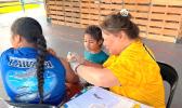 DoH nurse and student getting a vax.