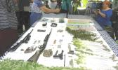 drugs, firearms, ammunition, and cash