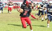 Faga’itua Vikings’ Fitu Amata is chased out to the sidelines