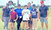 Junior golfers with parents and coaches