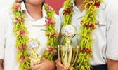 Schoolmates Jennifer Liang and Evelini Suani shined last week during the Territorial Math Competition. Liang placed third in the 8th grade division while Suani came in second place for the 9th grade division. [photo: Blue Chen-Fruean]