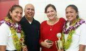 Proud parents Rev. Don and Hope Kruse with their twin daughters Jade and Jewel following the awards ceremony for the Territorial Math Competition last Friday. The girls competed in the Grade 8 Division with Jade coming in third place while twin sister Jewel took first place. [photo: Blue Chen-Fruean]