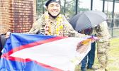 PFC Castro with American Samoa flag