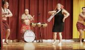 (L-R) Tino Savaiinaea, Chief Sikopu "Scope" Savaiinaea, Katie Savaiinaea-Elisaia and Niko Savaiinaea dance together