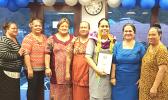 Manulele Tausala Elementary School principal, Martha Sagapolutele (third from right) with her award Certificate, after being named the “Principal of the Year” - school year 2017-2018.
