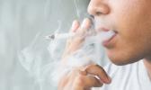 Image of man smoking