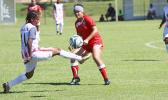 Susanna Lutali makes a pass with a New Caledonia opponent