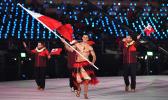  Tonga's flagbearer Pita Taufatofua leads his country's delegation. [Photo: AFP via RNZI]