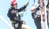 Trainee climbing tower