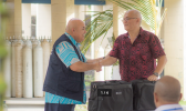 Professor Aiono Dr Alec Ekeroma receiving consumables 